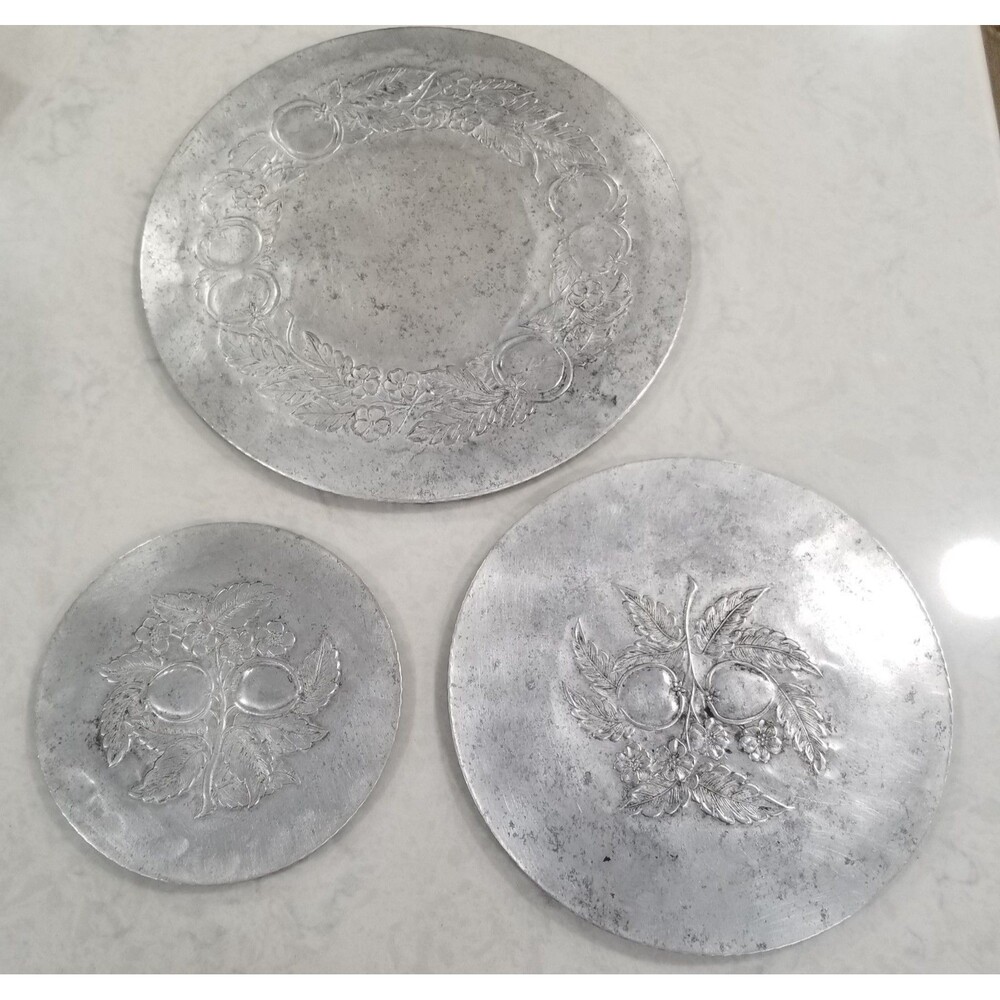Vintage Everlast forged aluminum hot plates trivets